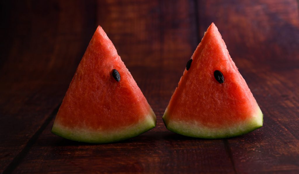 two sliced watermelon on the table